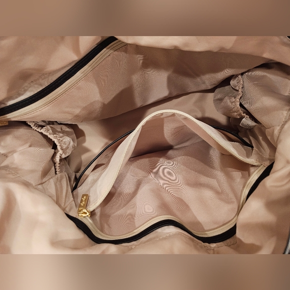 Itzy Ritzy Leopard Print Puffer Travel Bag with Black And Gold Accents - Picture 8 of 12